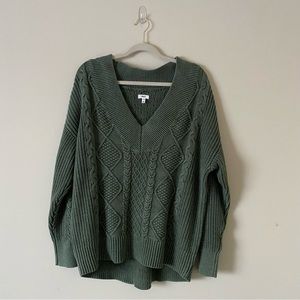 green cable knit sweater